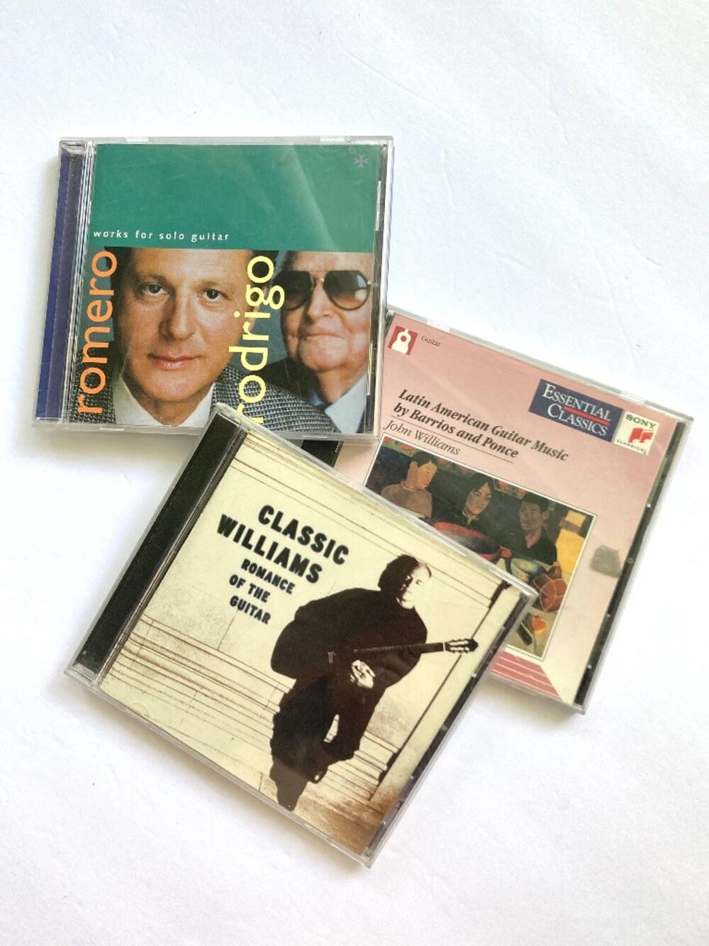 3 Audio CDs featuring the Guitar: 2 from John Williams, 1 by Romero and Rodrigo